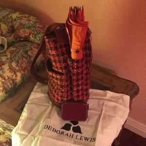 Deborah Lewis backpack with umbrella and wallet.